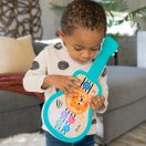 BABY EINSTEIN Zenélő fa játék ukulele Magic Touch HAPE 6hó+