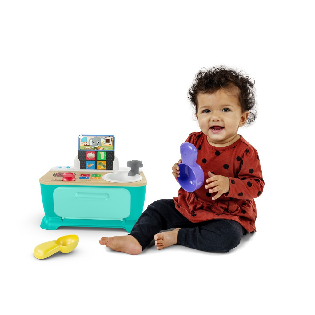 BABY EINSTEIN Zenélő játék konyha Magic Touch Kitchen™ Pretend to Cook HAPE 9hó+