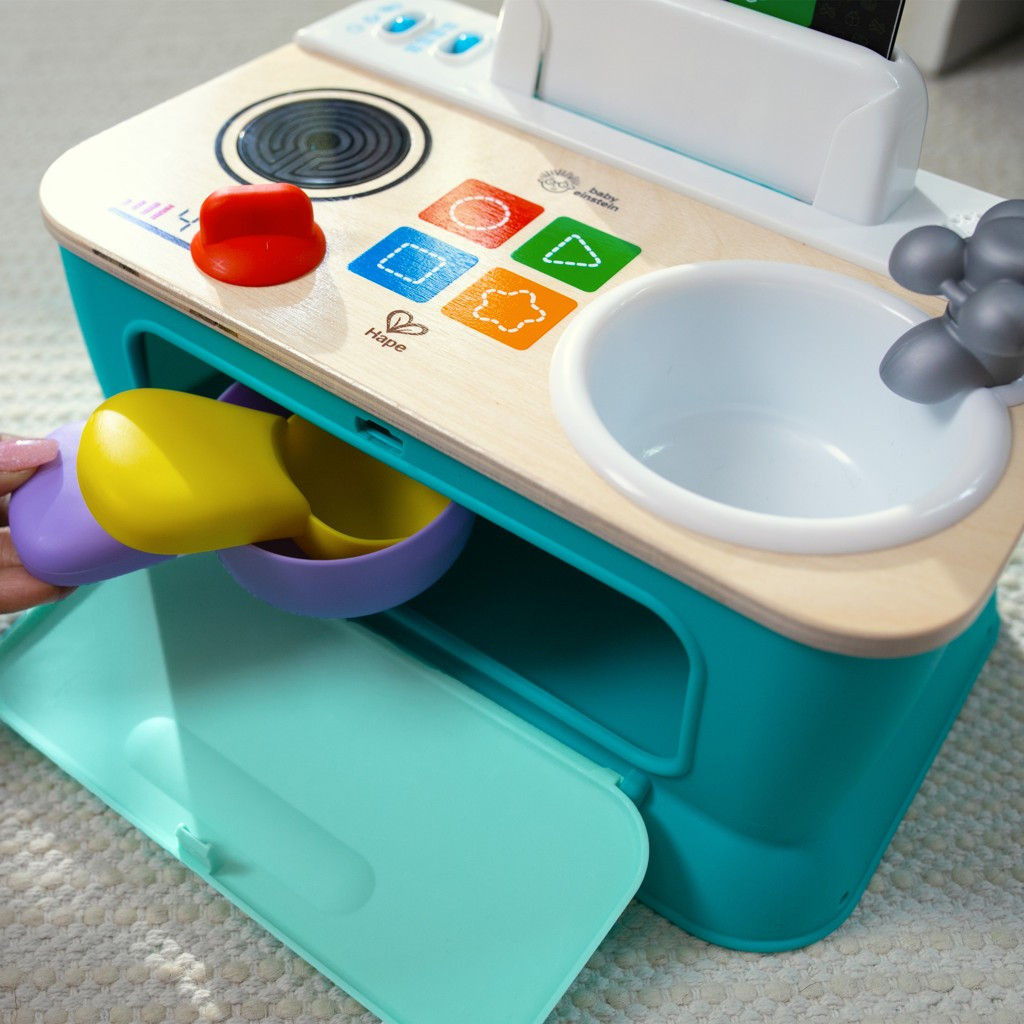 BABY EINSTEIN Zenélő játék konyha Magic Touch Kitchen™ Pretend to Cook HAPE 9hó+