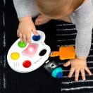 BABY EINSTEIN Zenélő érzékszervi játék Color Palette Popper 6-36hó