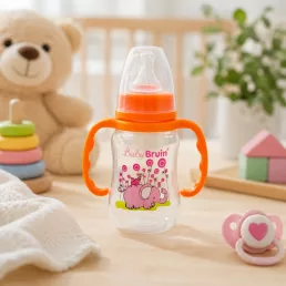   BabyBruin műanyag karcsúsított cumisüveg fogóval - narancs (125 ml)