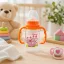 BabyBruin műanyag karcsúsított cumisüveg fogóval - narancs (125 ml)